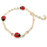 Load image into Gallery viewer, Child's 14k Yellow Gold Station Ladybug 5.3/4" Bracelet with Red and Black Enamel